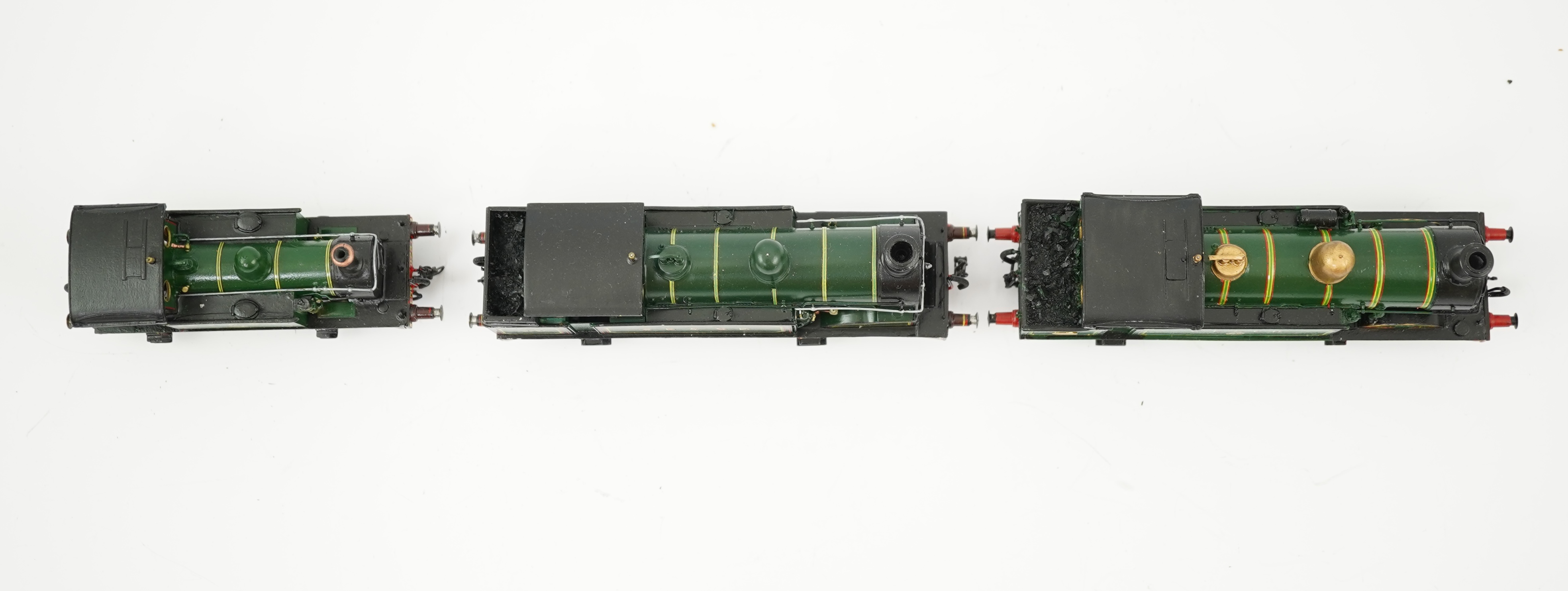 Three 00 gauge brass and white metal kit built Wainwright designed SE&CR tank locomotives (possibly by Wills Finecast); a class R1 0-4-4T, 696, a class H 0-4-4T, 263, and a class P 0-6-0T, 325, constructed, all painted a